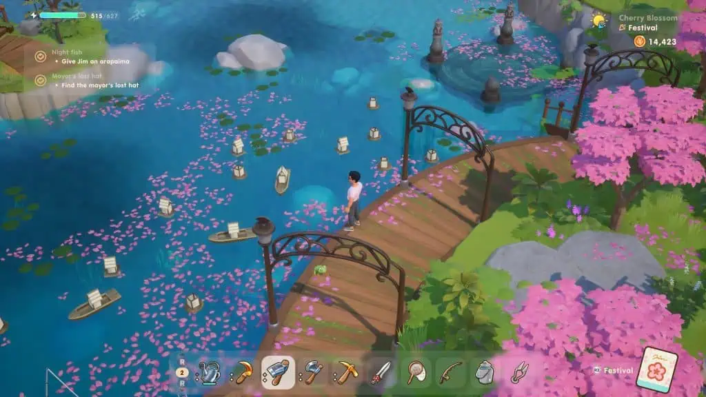 Beautiful water garden with pink blossoms and a wooden bridge in Coral Island.